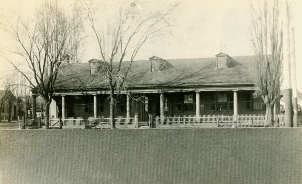 Fort Howard hospital, view of exterior of building with front porch and entrance.