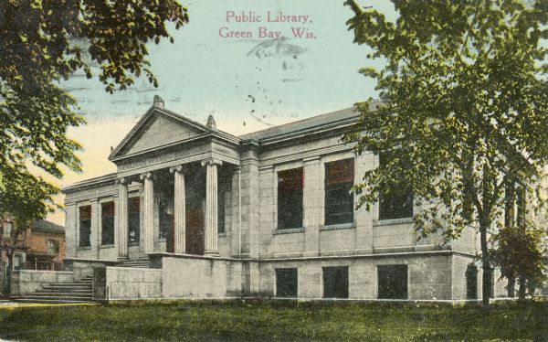 Exterior view of entrance to the public library. Caption reads: "Public Library, Green Bay, Wis."