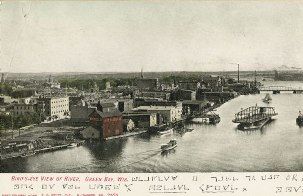 Elevated view of Fox River in the river district. Caption reads: "Bird's-eye View of River, Green Bay, Wis."