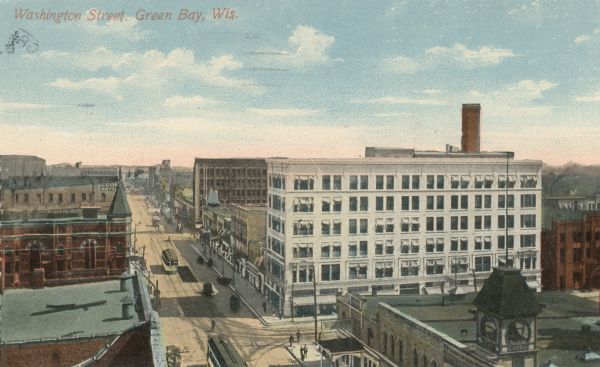 Elevated view looking down at Washington Street with cable car traffic. Caption reads: "Washington Street, Green Bay, Wis."