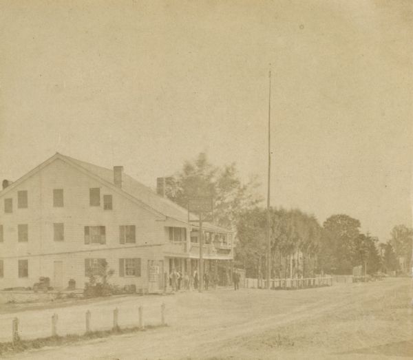 View down road towards the Western Hotel on the left. The original tavern was built in 1834 (?) by William Shields (?). In 1845 it was operated by his son Simon Shields. In 1873 the Hotel was taken over by Joseph Dreyfuss and was subsequently known as Hotel Dreyfuss. Presented in 1913 by the current proprietor Julius Dreyfuss, son of Joseph Dreyfuss.