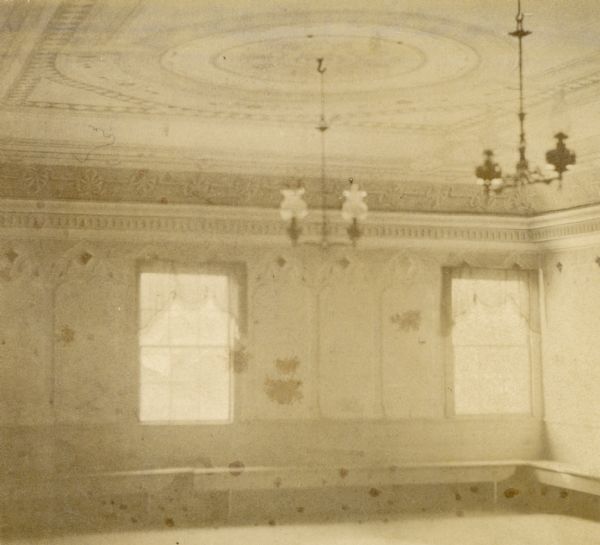 Interior of the Western Hotel. Benches are along the walls.