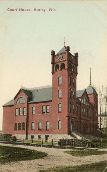 View across road toward the court house. Caption reads: "Court House, Hurley, Wis."