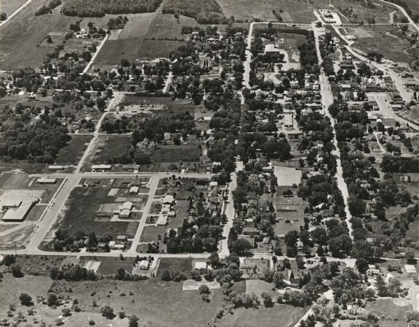 Aerial view of Iola, Wisconsin looking west. Located in the lower left corner is an elementary school.