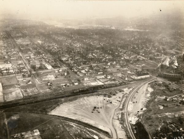 Aerial view of Janesville showing the river fill for the new sewerage disposal plant.