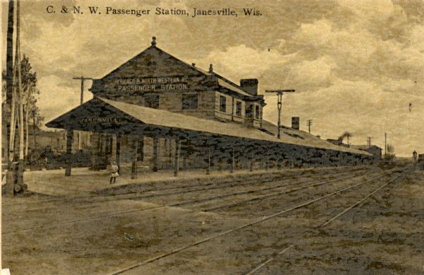 The Chicago and Northwestern Passenger Station in Janesville. Caption reads: "C. & N. W. Passenger Station, Janesville, Wis."