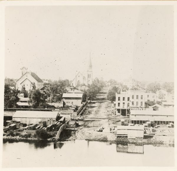 Elevated view over river of Dodge Street in Janesville looking west.