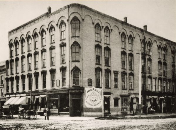 The Lappin block, Ed. Carpenter, proprietor. Businesses on this block include: Bort, Baily & Co., Dry Goods and Carpets; A.F. Hall & Co., "The Reliable Jewlers"; J.W. Brown, Fine Cigars and Tobaccos; S.C. Burnham & Co., Jewelry and Music House.