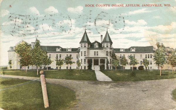 View from road towards the insane asylum. Caption reads: "Rock County Insane Asylum, Janesville, Wis."
