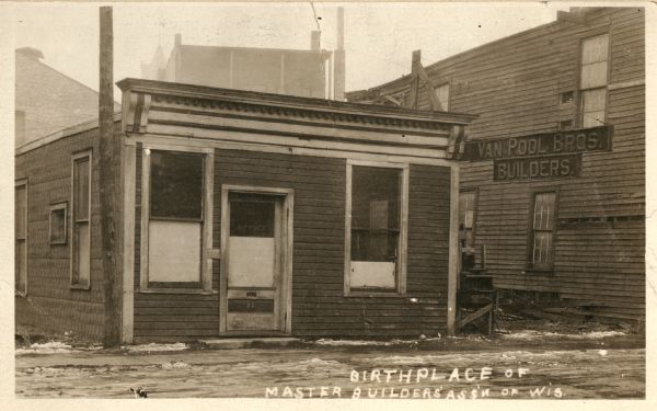 Front view of the Van Pool Brothers office, where the Master Builders' Association of Wisconsin was founded. Caption reads: "Birthplace of Master Builders Assn of Wis".