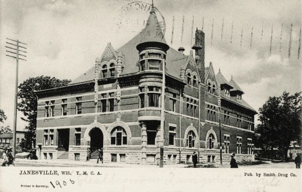 View across street towards the Y.M.C.A. building. Caption reads: "Janesville, Wis. Y.M.C.A."