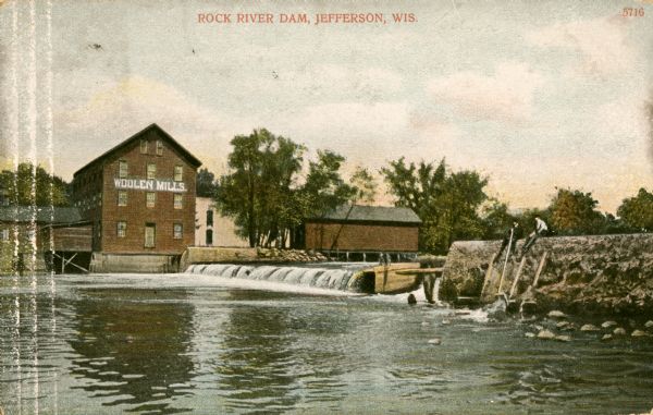 The Rock River Dam with the Woolen Mills building in the background. Caption reads: "Rock River Dam, Jefferson, Wis."