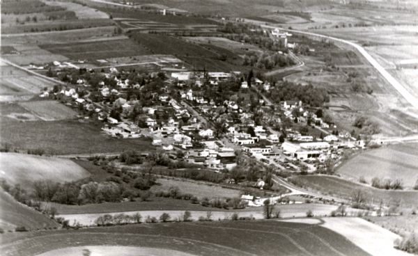 Aerial view of town, looking west.