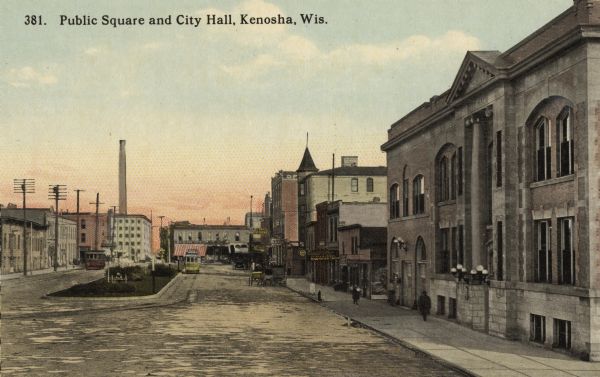View down street toward the Kenosha City Hall and Public Square. Caption reads: "Public Square and City Hall, Kenosha, Wis."