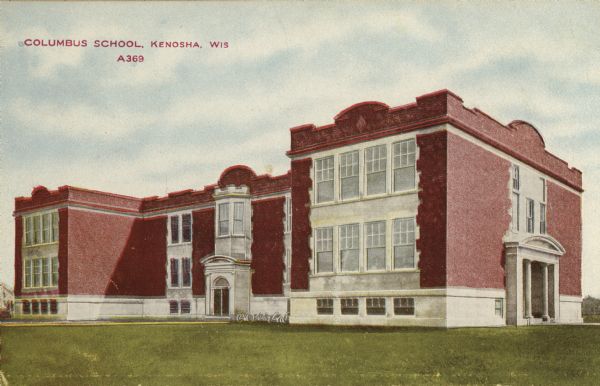 View across lawn toward the school building. Caption reads: "Columbus School, Kenosha, Wis."