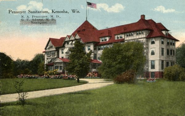 The Pennoyer Sanitarium, later called the Pennoyer Home. The structure was built in 1890 on the north end of Milwaukee Avenue. It was later used as St. Catherine's Hospital until it was razed about 1930. Caption reads: "Pennoyer Sanitarium, Kenosha, Wis. N. A. Pennoyer, M.D., G. F. Adams, M. D., Managers."