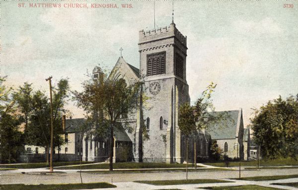 View across street towards the church. Caption reads: "St. Matthews Church, Kenosha, Wis."