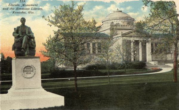 The Lincoln monument is on the left, and the library is in the background on the right. Caption reads: "Lincoln Monument and the Simmons Library, Kenosha, Wis."