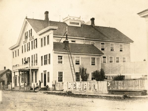 The Forest House, a hotel, restaurant and stage office. It was operated by Mr. and Mrs. Chas. A. Dingle and was located on the corner of Third and Forest Streets where Fire Station #1 now stands. The original Forest House, built on the same location, was built in the 1840's but was removed and replaced by the structure shown in the picture in the 1860's. This one was burned in 1878 completely.