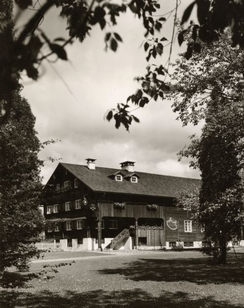 The Waelderhaus a memorial planned for John Michael Kohler the founder of the Kohler Company, by his daughter, Marie Christine Kohler. Waelderhaus is a replica of his family's home in Schoppernau, Bregenzwewald, Austria. An Austrian architect, Kasper Albrecht, was brought over to this country in 1929 to design and supervise its construction and furnishing. In 1931 it was officially dedicated as a club house for the Girl Scouts, an active interest of Miss Kohler.