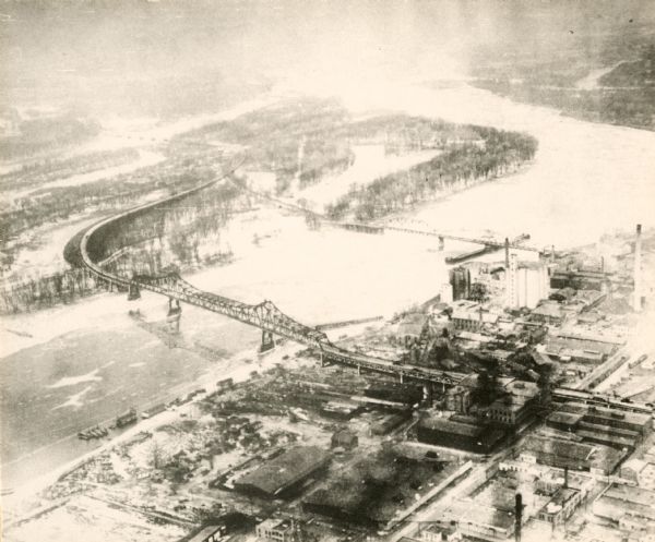 An aerial view of La Crosse and the Mississippi River with the bridge drawn in to show what the finished product would look like.