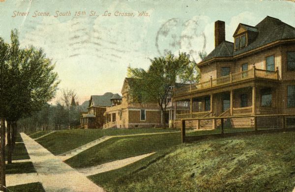Residential homes on the right side of South 15th Street. Caption reads: "Street Scene, South 15th St., La Crosse, Wis."
