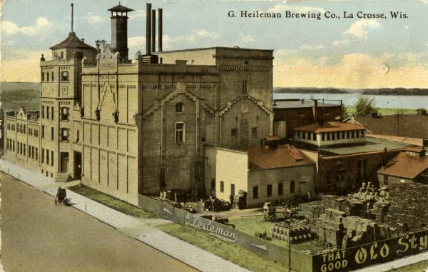 Elevated view of the brewery with the Mississippi River in the background. Caption reads: "G. Heileman Brewing Co., La Crosse, Wis."
