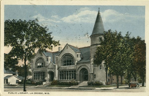 Exterior view across road toward the library. Caption reads: "Public Library, La Crosse, Wis."