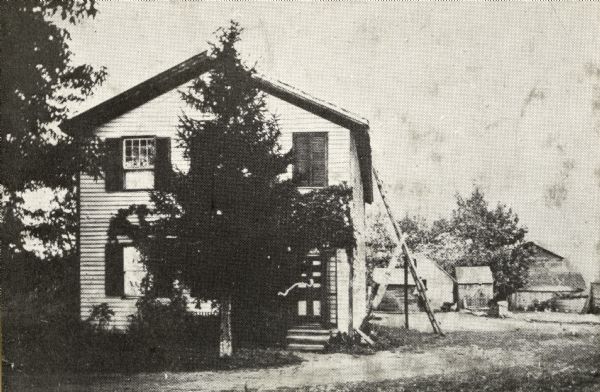 The home of Justice Charles Dunn. In 1906 it was the farmhouse of Chris Cerdt.