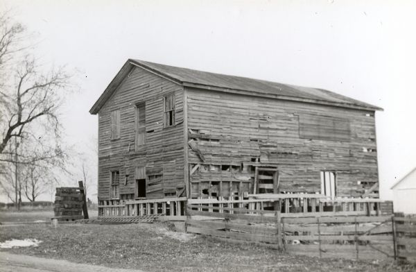 Building used as a lodging house for the First Territorial Legislature held in Belmont in 1836. West end and south side.