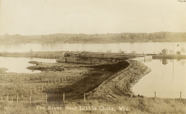 View looking down at the lock. Caption reads: "Fox River Near Little Chute, Wis."