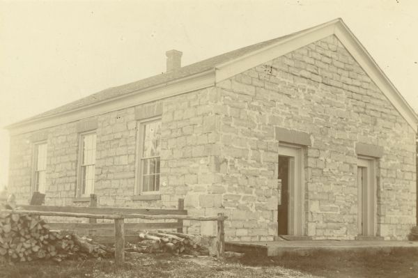 The "Rock Church". At this time there were only two churches in or near Livingston; one a Free Methodist and the other a Methodist Episcopal Church. This is presumably one of these.
