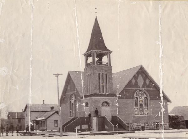 Methodist Episcopal Church and parsonage built under Rev. G.N. Foster.
