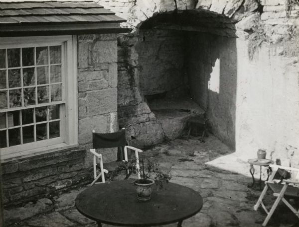 Slightly elevated view of the patio area of a Cornish house.