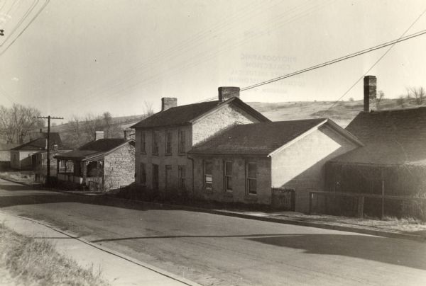 Shake Rag Street, showing Cornish miner's homes. The street was formerly called Hoard Street in honor of Capt. R.C. Hoard who was stationed at Fort Defiance during the Black Hawk War (1831-1832).