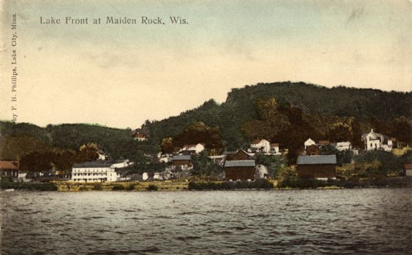 The view of the Lake Front from across the Mississippi River. Caption reads: "Lake Front at Maiden Rock, Wis."