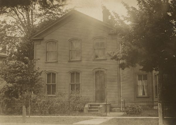 The home of Adolph Piening on Hancock Street (near Eight Street). The house was next door to the German Lutheran School and this site now is used by the school.