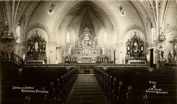 The highly decorated and ornamented interior of a Catholic church in Marathon.