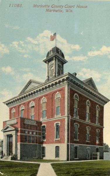 View toward the front and right side of the courthouse. Caption reads: "Marinette County Court House, Marinette, Wis."