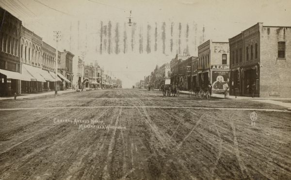 The north end of Central Avenue. Caption reads: "Central Avenue North, Marshfield, Wisconsin."