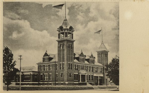 View across street towards the City Hall in Marshfield. Caption reads: "City Hall — Marshfield, Wis."