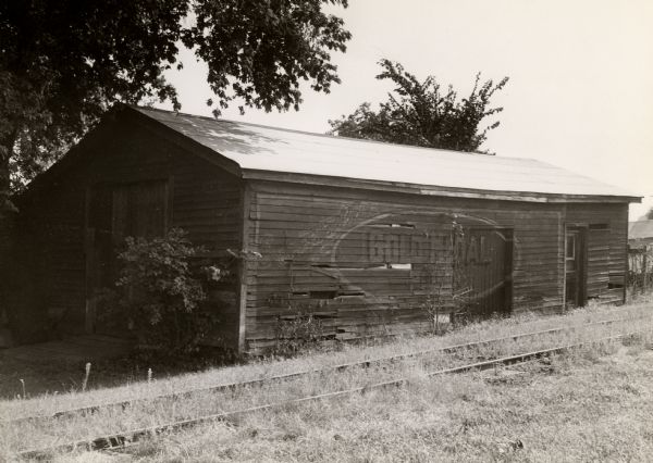 The Chicago, Milwaukee, and St. Paul Railway Depot built about 1855-1856 by W.H. McFarland. The building seen in the picture still has the original timbers and siding, however the building has been moved (in 1881-1883) across the railroad track and across Main Street to the back of the farm of Joe McFarland where it is now used as a garage.