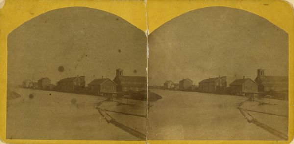 A stereograph of the Menasha Wooden Ware factory.