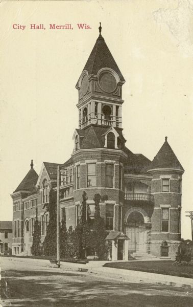 View across street toward City Hall. Caption reads: "City Hall, Merrill, Wis."