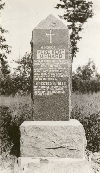 The Menard Monument was erected in honor of Pere Rene Menard who was lost in the area in 1661 while en route to Huron Village to baptize Native Americans. The monument stands on the river road between Merrill and Tomahawk, Wisconsin.