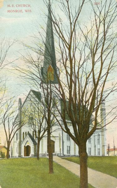 Exterior of the  Methodist Episcopal Church. Caption reads: "M.E. Church, Monroe, Wis."