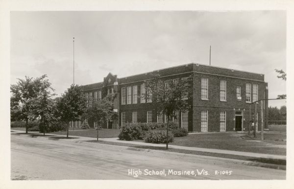 Exterior view across street toward high school. Caption reads: "High School, Mosinee, Wis."