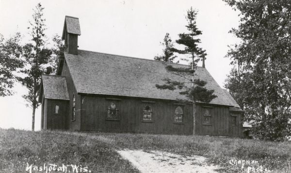 Side view of Holy Innocents Church. Caption reads: "Nashotah, Wis."