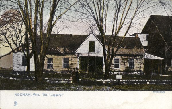 Front view of the home of James Duane Doty on Doty's Island, "the loggery," built in 1844. Caption reads: "Neenah, Wis. The 'Loggery."