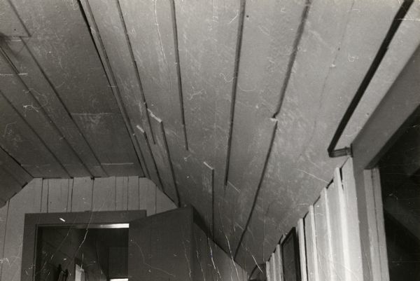 Detailed view of the board and batten construction of "the Loggery", the home of James Duane Doty.